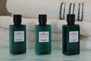 Luxurious bathroom amenities by Apivita Chopard and Hermès